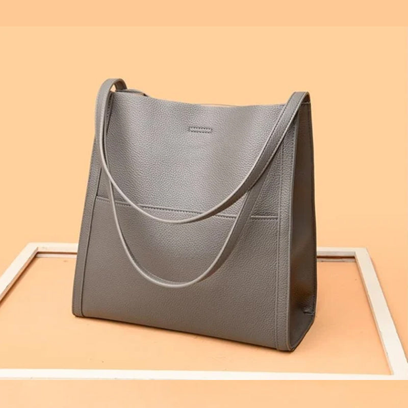 🔥👜👜【45% OFF】Veľkokapacitná jednoduchá jednofarebná jesenná mäkká kožená taška cez rameno