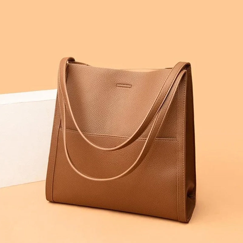 🔥👜👜【45% OFF】Veľkokapacitná jednoduchá jednofarebná jesenná mäkká kožená taška cez rameno