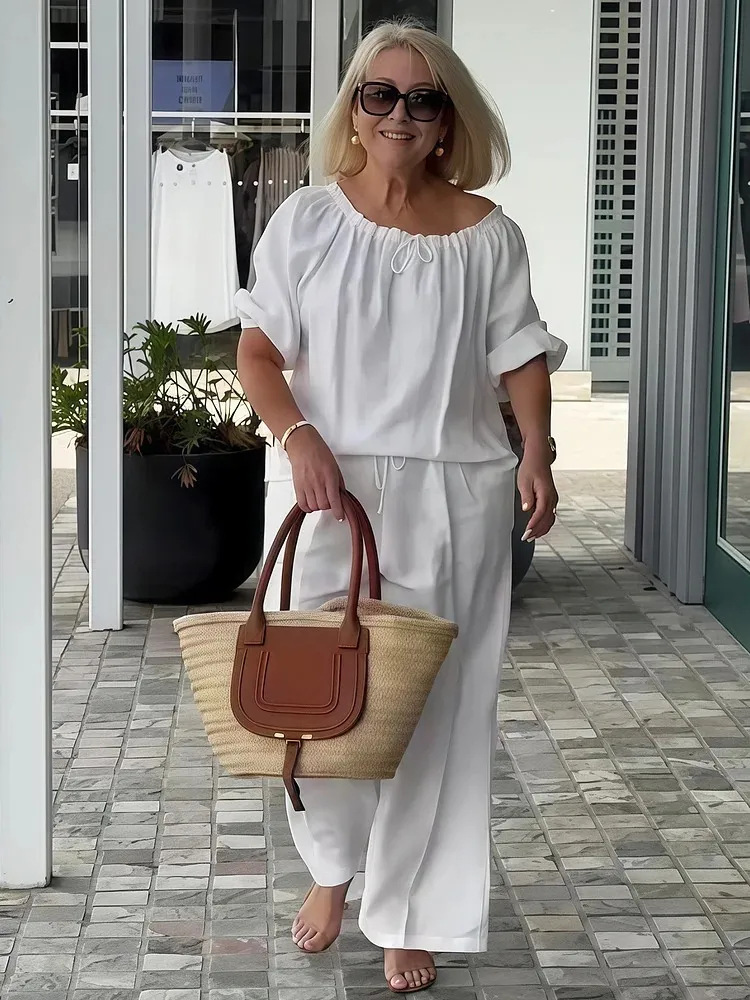 👑💃Conjunto de Verano 2026: Corte Relajado en Algodón y Lino 【Blusa de Cuello Redondo con Cordón + Pantalones】