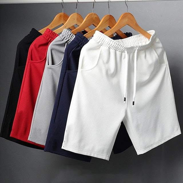 💥[Compra 2 y llévate 3 gratis] 🏃‍♂️Pantalones cortos de cinco puntos de malla de seda de hielo: secado rápido, transpirables y holgados.