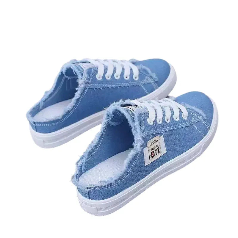 Zapatillas mule de denim deshilachado para mujer