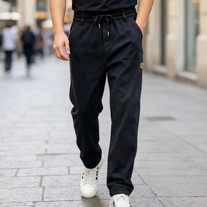 👖【M-6XL】Pánske džínsy so širokými nohavicami, elastické, pohodlné, odolné voči špine a vhodné do práce