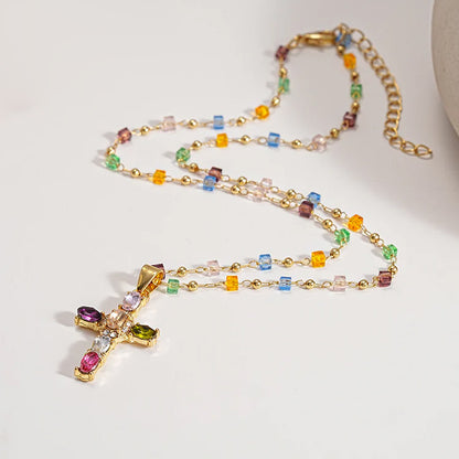 Oferta: Collar con cruz de circonitas de colores. Incluye un precioso joyero.
