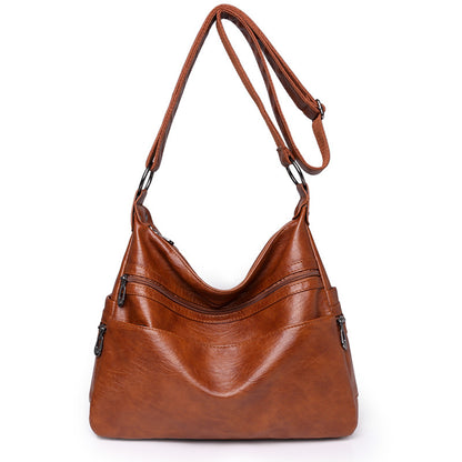 👜【Oferta por tiempo limitado】Nuevo bolso de hombro de piel suave de moda 2026, amplio, resistente al desgaste, piel auténtica